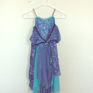 teal blue and purple sequined costume